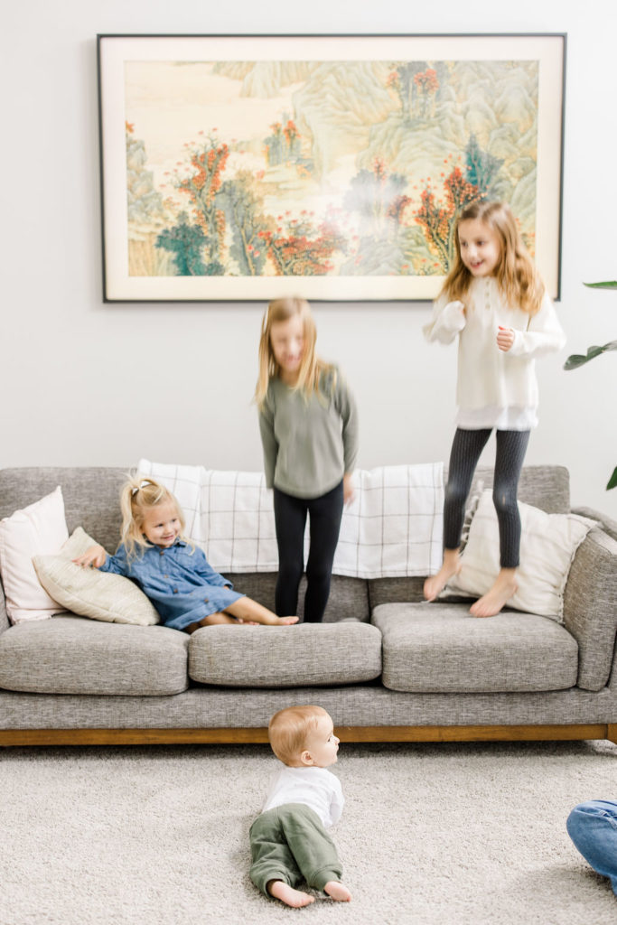 kids jumping on the couch